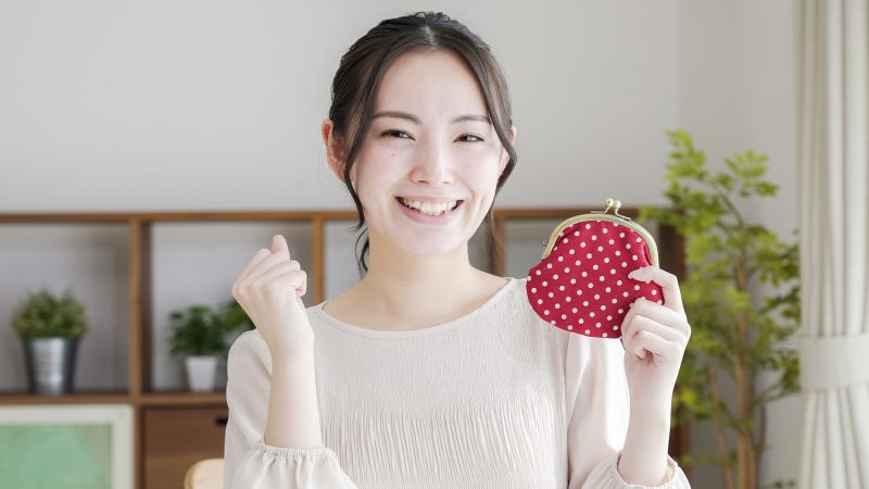 財布/女性/笑顔